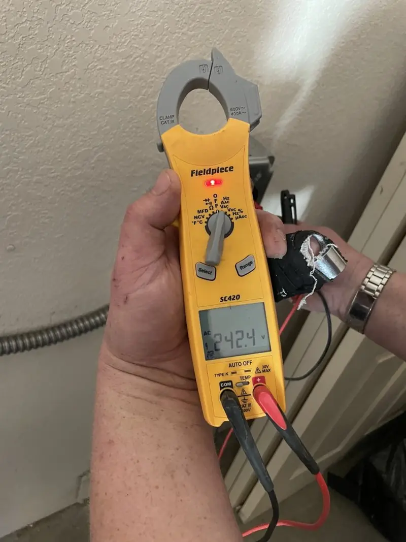 Voltage testing with clamp meter during Generator Installation in Long View